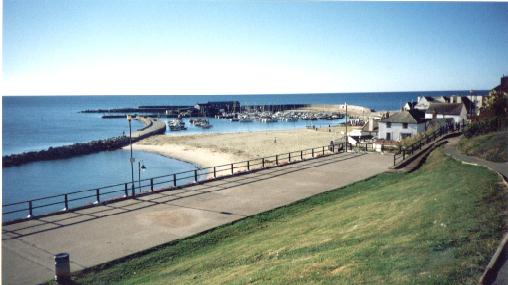 The Cobb harbour  with views at Lyme Regis, Dorset, South West, UK